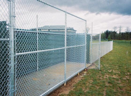 How far apart should the chain link fence be?